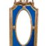 An Ornate Rococo Style Carved Giltwood And Bevelled Mirror With Royal Blue Suede Inner Lining