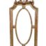 An Ornate Rococo Style Carved Giltwood And Bevelled Mirror