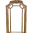 An Ornate Rococo Style Carved Giltwood And Bevelled Mirror