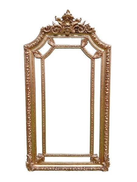 An Ornate Rococo Style Carved Giltwood And Bevelled Mirror