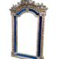An Ornate Rococo Style Carved Giltwood And Bevelled Mirror With Royal Blue Suede Inner Lining