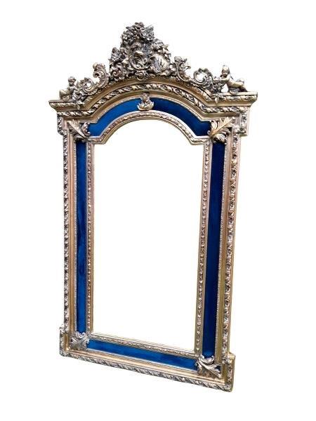 An Ornate Rococo Style Carved Giltwood And Bevelled Mirror With Royal Blue Suede Inner Lining