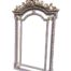 An Ornate Rococo Style Carved Giltwood And Bevelled Mirror