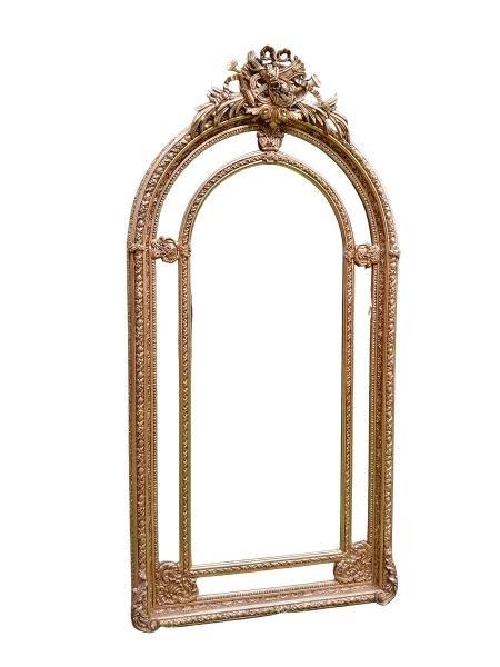 An Ornate Rococo Style Carved Giltwood And Bevelled Mirror
