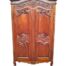 A 20th Century French Style Ornately Carved Cherry Wood Armoire