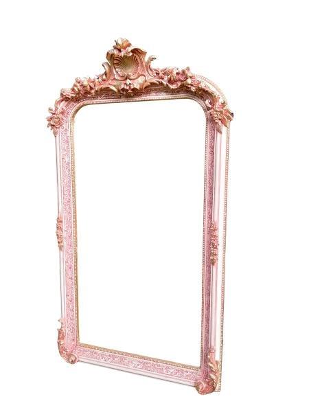 An Ornate Rococo Style Carved Giltwood And Bevelled Mirror