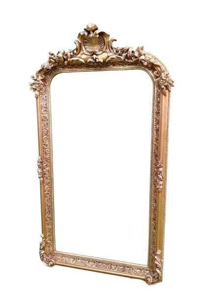 An Ornate Rococo Style Carved Giltwood And Bevelled Mirror