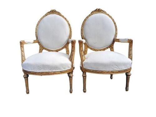 A French Style Pair of Ornately Carved Giltwood Armchairs Upholstered in Original Cream Fabric