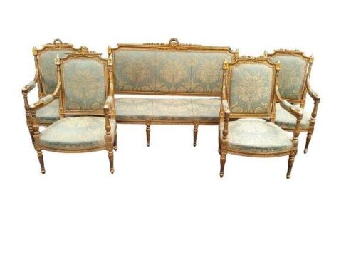 A French Style Ornately Carved Giltwood Settee with 2 Pairs of Armchairs