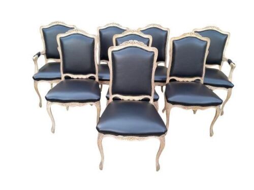 A 20th Century Set Of Eight Chairs Comprising Two Armchairs And Six Dining Chairs In A Contemporary Bleached Finish And Upholstered In Leather