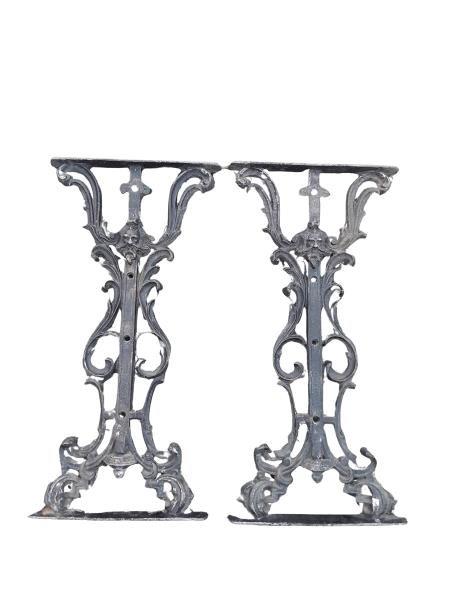 A 20TH Century Victorian Pair Of Cast Metal Legs