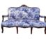 A French Style Ornately Carved Wooden Settee Upholstered in Blue and White Toile Fabric
