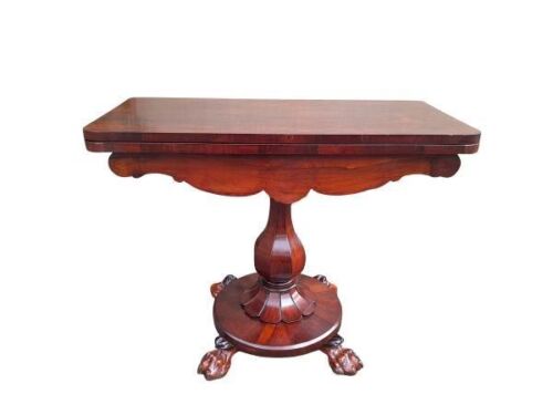 An Antique A William IV Carved Rosewood Card Table On Paw Feet