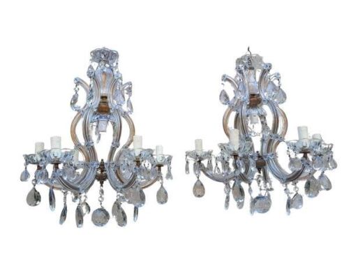 A 20th Century Near Pair Of  French Style Crystal And Gilt Metal Chandeliers