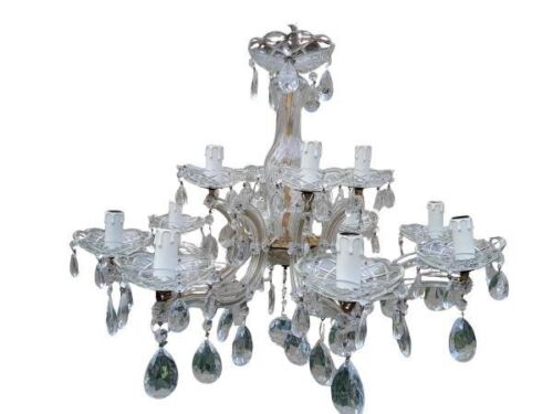 A 20th Century French Style Gilt And Crystal Eight Light Chandelier