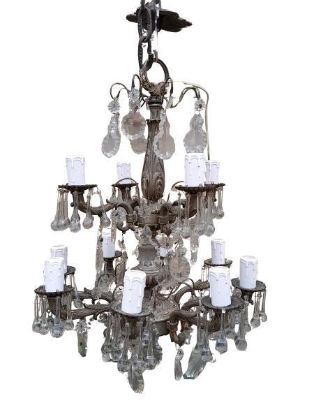 An Antique Early 20TH Century Gilt Metal And Crystal Twelve Light Chandelier