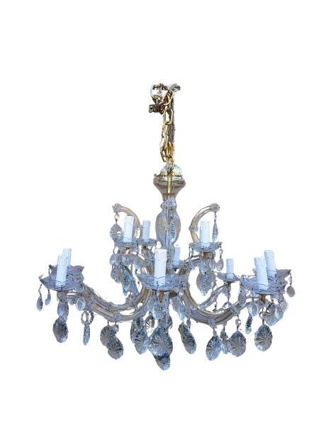 A 20th Century French Style Gilt And Crystal Eight Light Chandelier