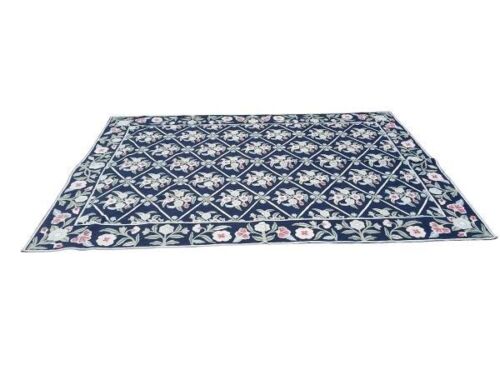 A Needlepoint Floral Carpet