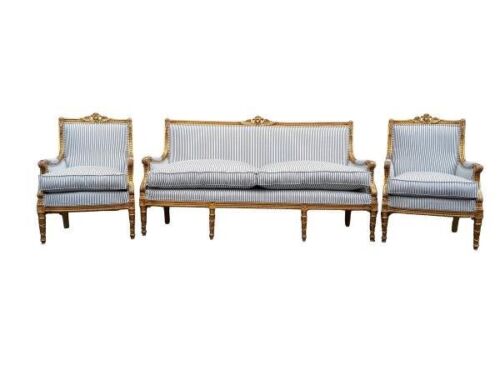 A 20TH Century French Style Ornately Carved and Gilded Settee and Pair of Matching Armchairs