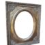 A 20th Century Ornately Carved Giltwood And Bevelled Mirror