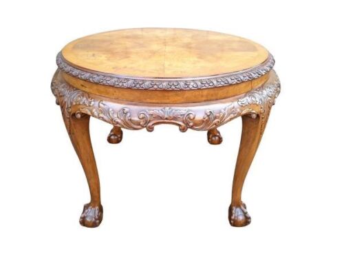 An Antique Ornately Carved Burr Walnut Table