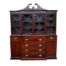 An Antique 19th Century Flame Mahogany Georgian- Style Secretaire Bookcase With Gilt Tooled Leather Writing Surface With Drawers And Cupboards