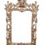 An Antique 19th Century Rococo Style Ornately Carved Giltwood Mirror
