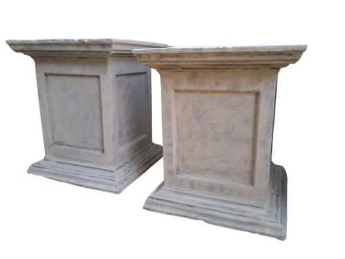 A Pair Of Concrete Plinths With Patina Finish By The Crown Collection