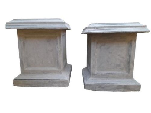 A Pair Of Concrete Plinths With Patina Finish By The Crown Collection