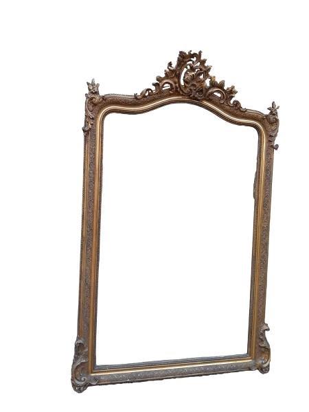 An Antique 19th Century French Louis XV Style Ornately Carved Giltwood And Bevelled Mirror