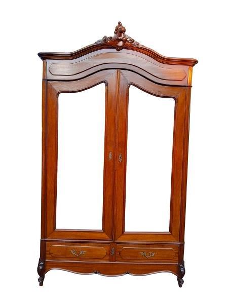 An Antique 19th Century French Carved Mahogany Armoire With Bevelled Mirror Doors