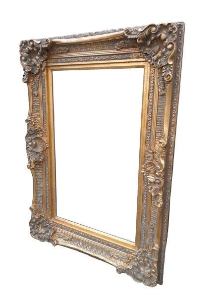 A Gilt Painted And Bevelled Mirror
