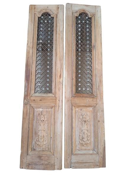 An Antique 19th Century French Colonial Pair Of Decorative Panelled And Wrought Iron Doors (Can Be Used Decoratively On Either Side Of A Mirror On A Wall)