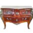 A 20th Century French Louis XV Style Walnut And Mahogany With Brass Mounts Chest Of Drawers / Commode With A Cream Marble Top