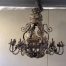 A Hexagonal base Wrought Iron Hand Painted Chandelier with crown detail 