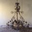 A Large Hexagonal base Wrought Iron Hand painted Chandelier with crown detail 
