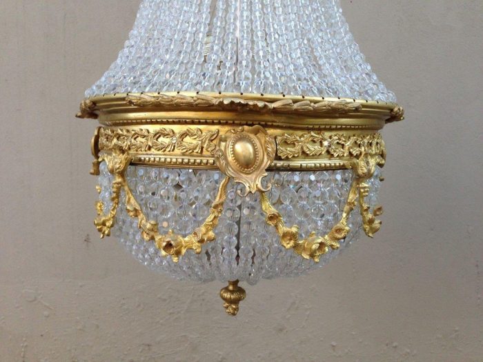 A 20th Century Empire Style Brass and Crystal Chandelier - Image 3