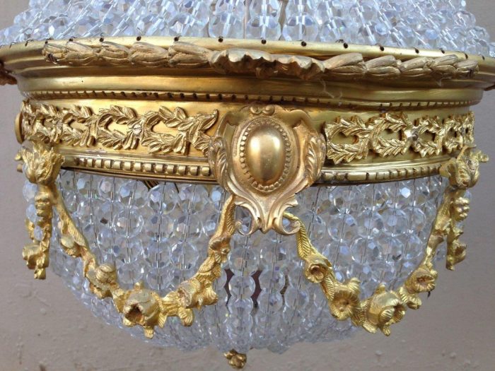 A 20th Century Empire Style Brass and Crystal Chandelier - Image 4