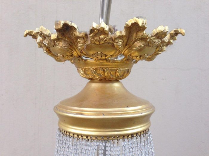 A 20th Century Empire Style Brass and Crystal Chandelier - Image 5