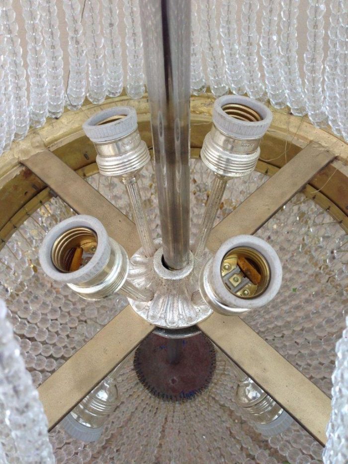 A 20th Century Empire Style Brass and Crystal Chandelier - Image 7