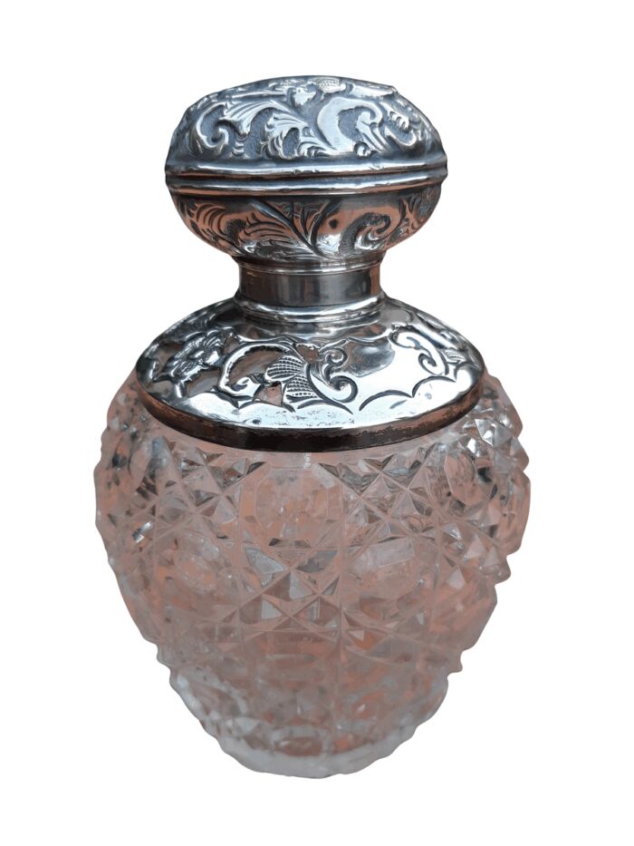 An Edward VII Silver Mount Ladies Dressing Table Scent Bottle  Maker: William Henry Sparrow, London 1905, (Nicks to crystal)