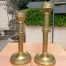 A Set Of Two Ecclesiastical Brass Candlesticks