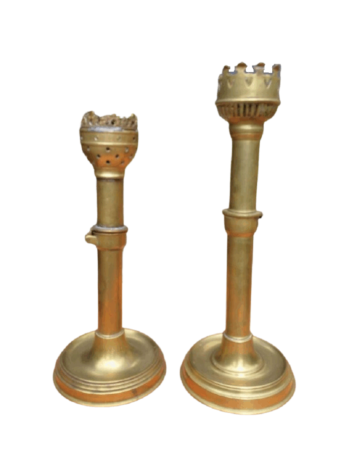A Set Of Two Ecclesiastical Brass Candlesticks