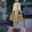 A Large Decorative Carved Gilded Statue On A Custom-Made Perspex Base ND