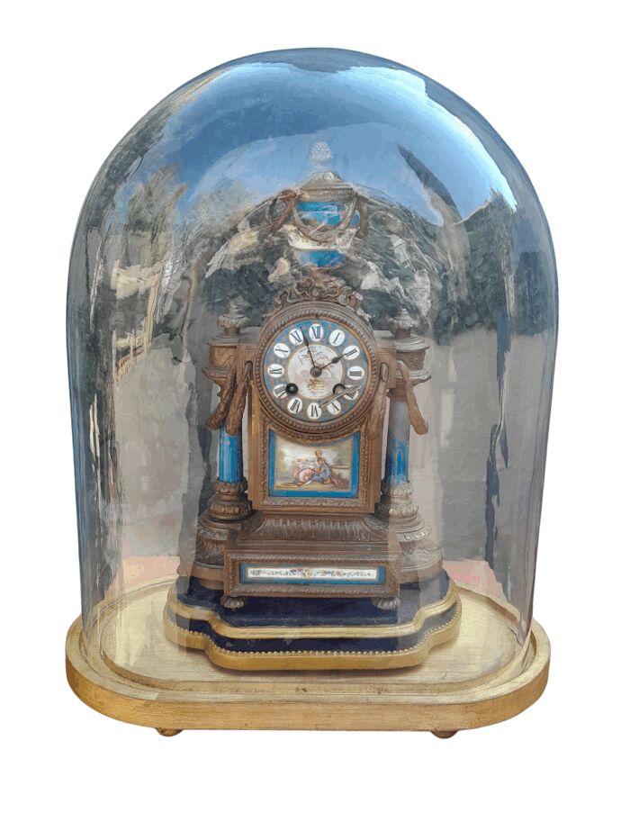 A 19th Century French-style MARSHALL & SONS Edinburgh Gilt Metal and Hand-Painted Ceramic Clock with Roman Numerals Encased in an Imported and Hand Gilded Glass Cloche of Large Proportion