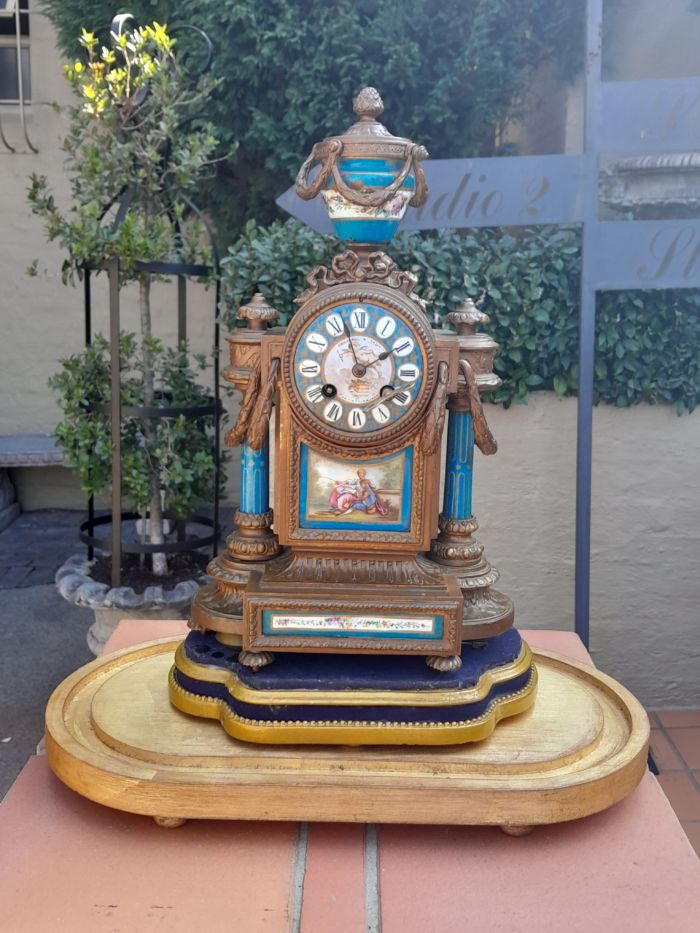 A 19th Century French-style MARSHALL & SONS Edinburgh Gilt Metal and Hand-Painted Ceramic Clock with Roman Numerals Encased in an Imported and Hand Gilded Glass Cloche of Large Proportion - Image 3