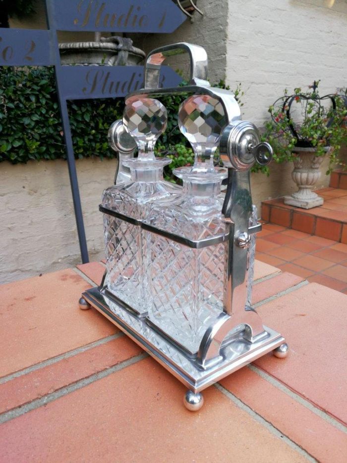 A Silver- Plate Tantalus With Two Cut-Glass Decanters - Image 4