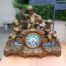 A 20th Century French Spelter And Gilt And Spelter Clock With Porcelain Plaques.  Has Key And Pendulum