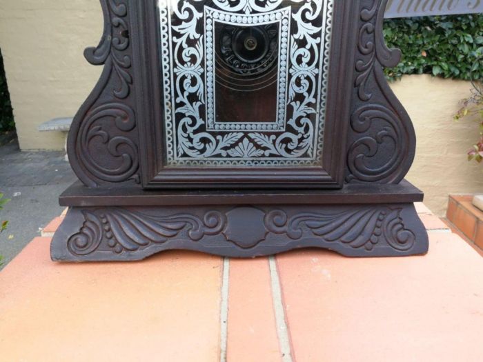 An Early 20th Century American Ebonised & Ornate Carved Oak Mantel Clock - Image 7