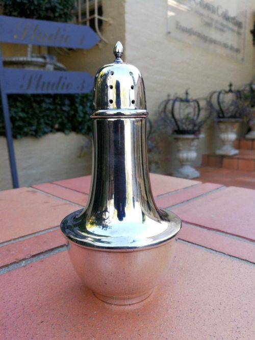 A Silver-Plated Castor Shaker